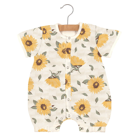 Baby romper with sunflower pattern on a white background